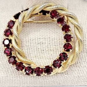 Elegant Gold and Red Gemstone Brooch